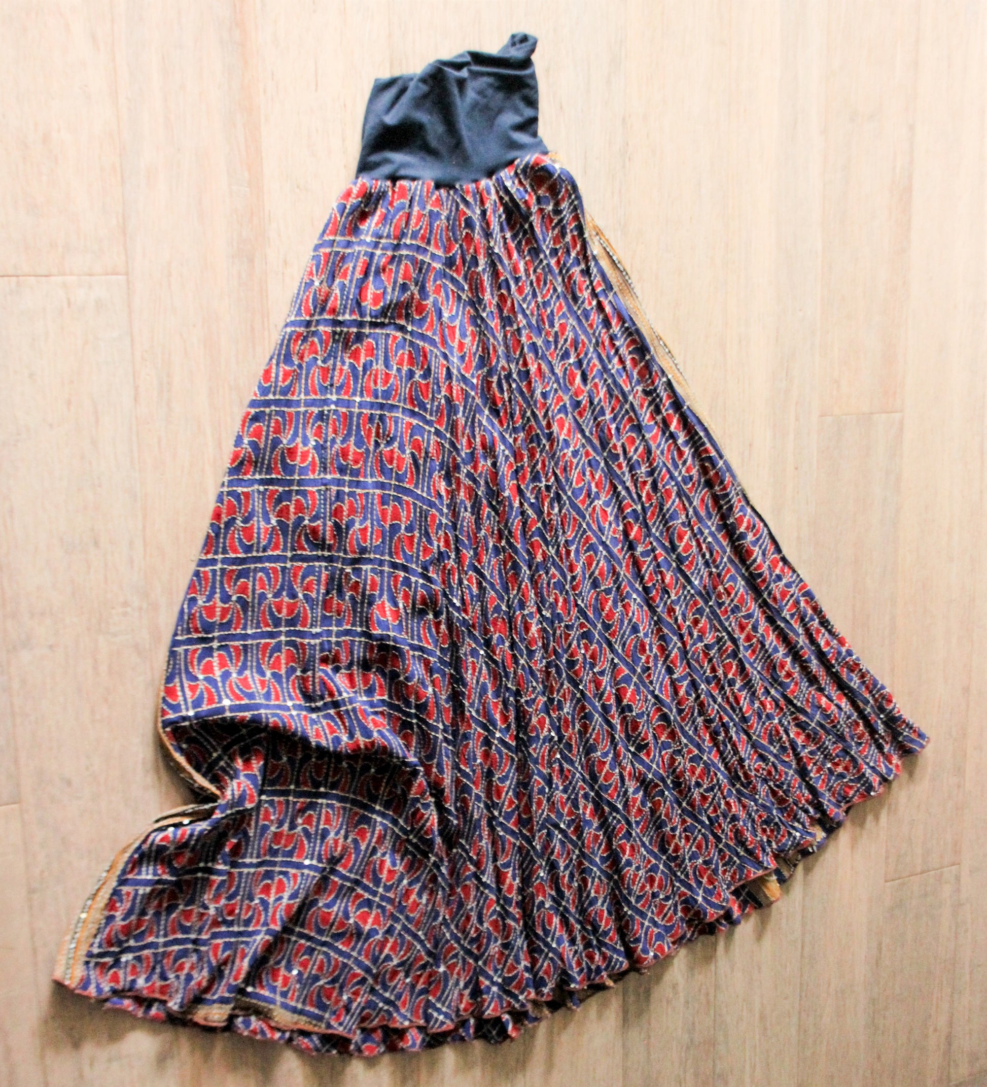 A blue-purple silk sari skirt showing hand stiching