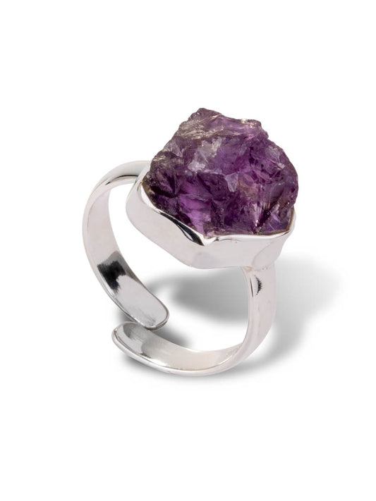 Silver ring set with raw cut amethyst. with an adjustable band