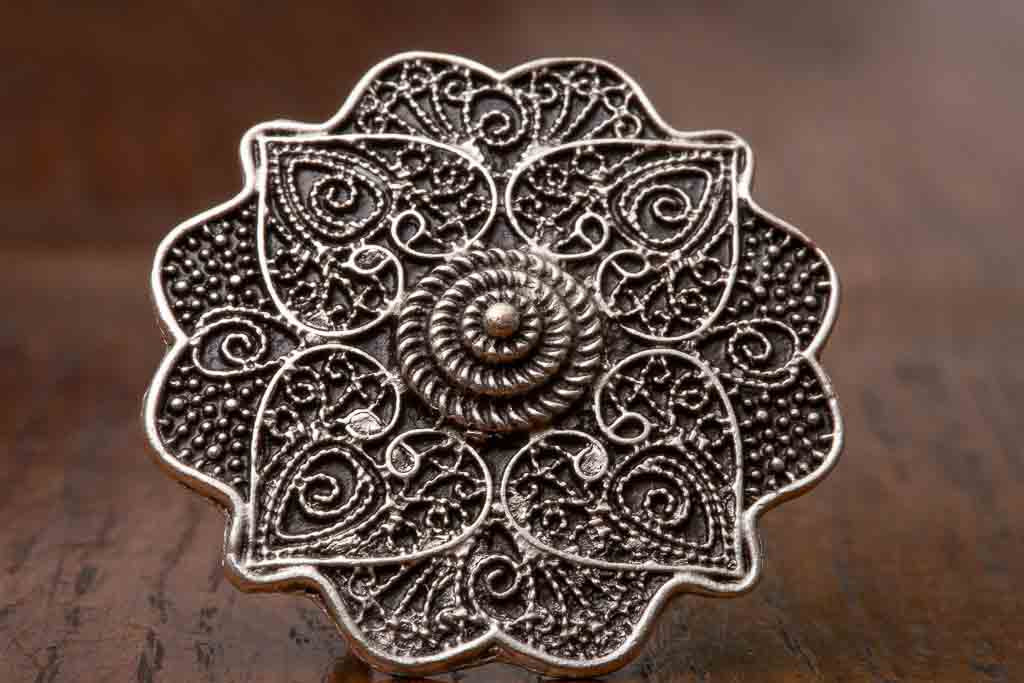 Persia Ring  - a detailed filigree flower motif design. Adjustable band