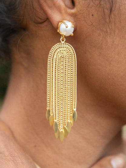Gold luxe statement earrings pearls and tales