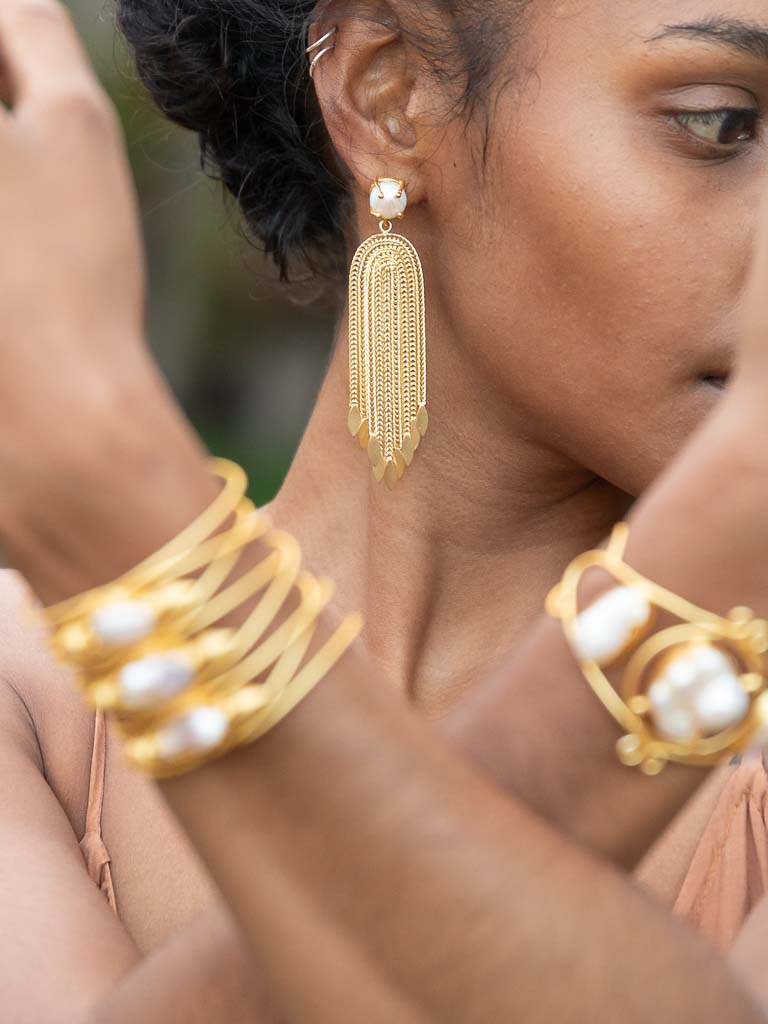 Gold luxe statement earrings pearls and tales