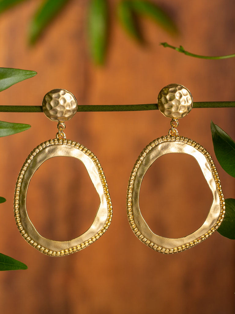 Orbit Earring Gold stud with dimples and a light weight orb hanging.