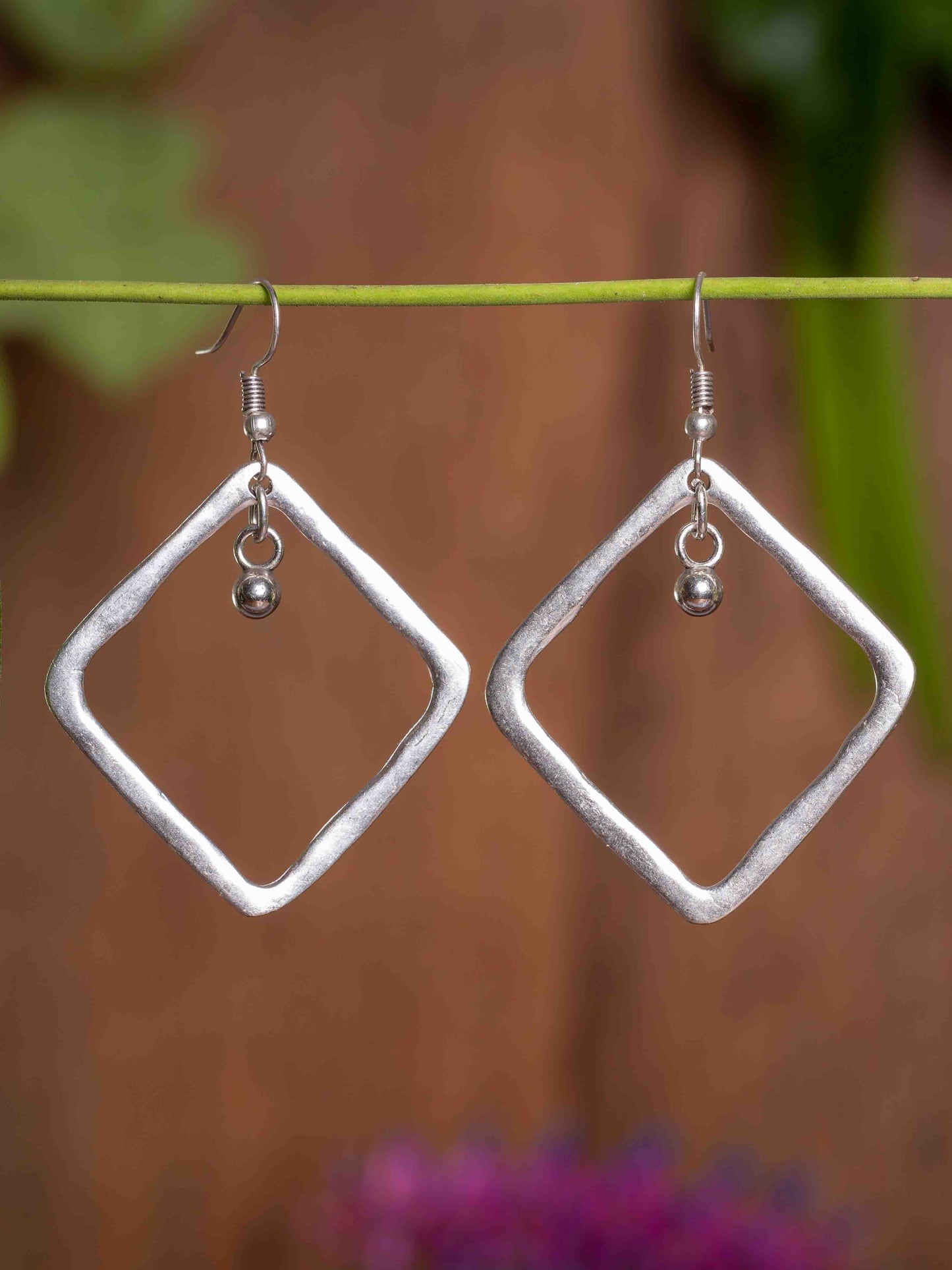 Silver plated detailed Diamond shaped earrings
